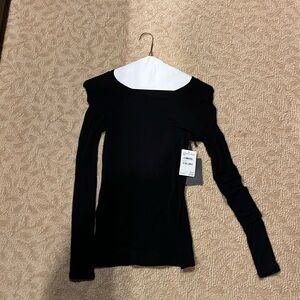 Woman’s black long sleeve top